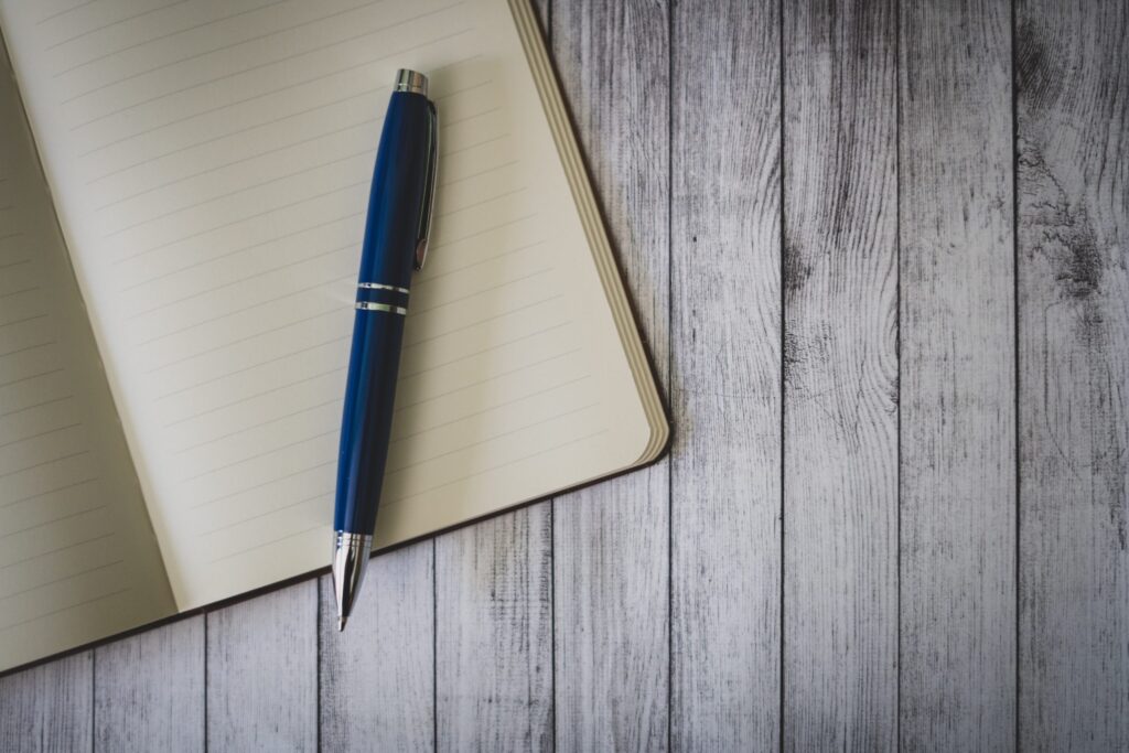 Book and Pen Heading